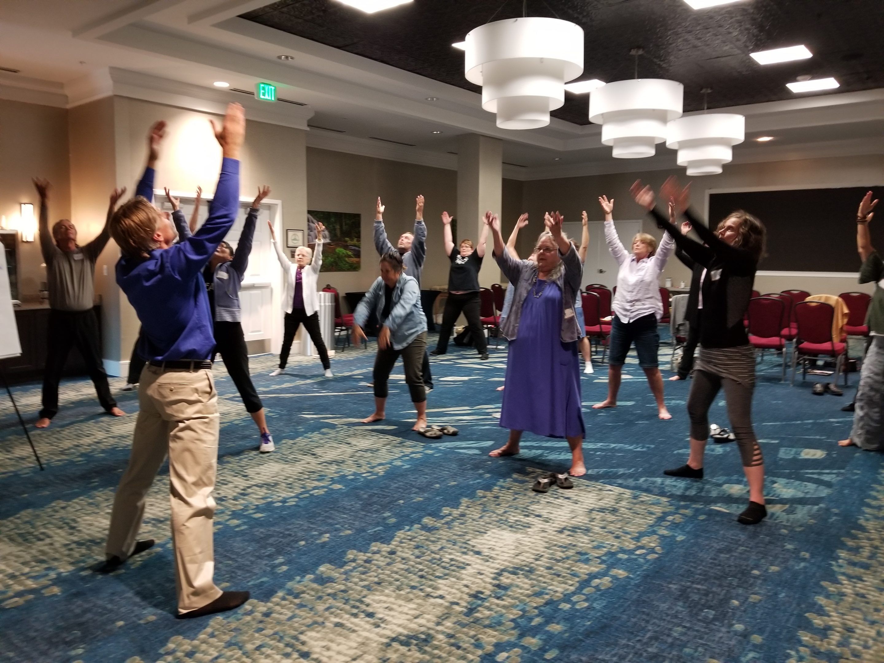 Live Qigong Workshop with Medical Qigong Master David J., Coon in photograph with students