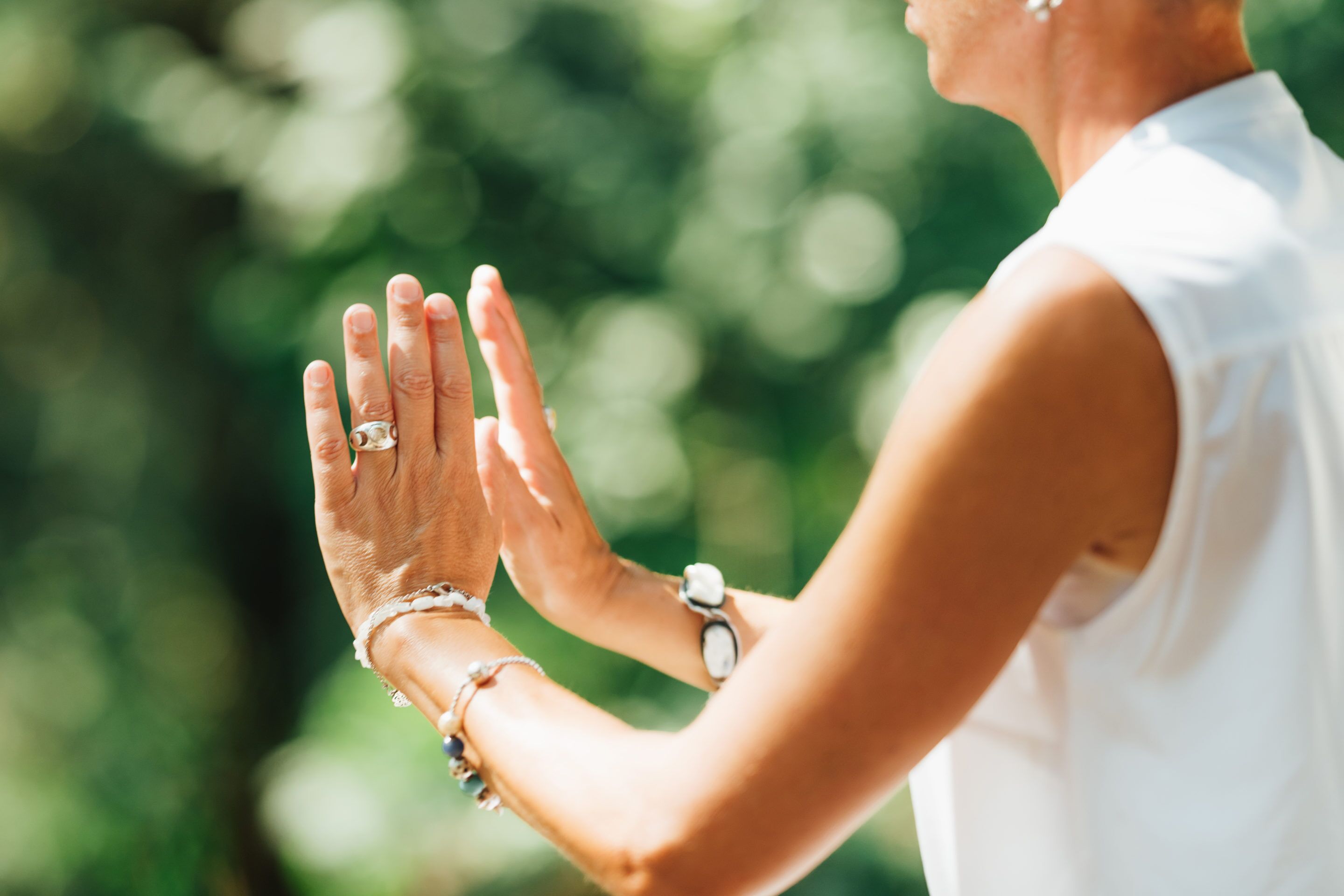 Woman Practicing Qigong in The Park